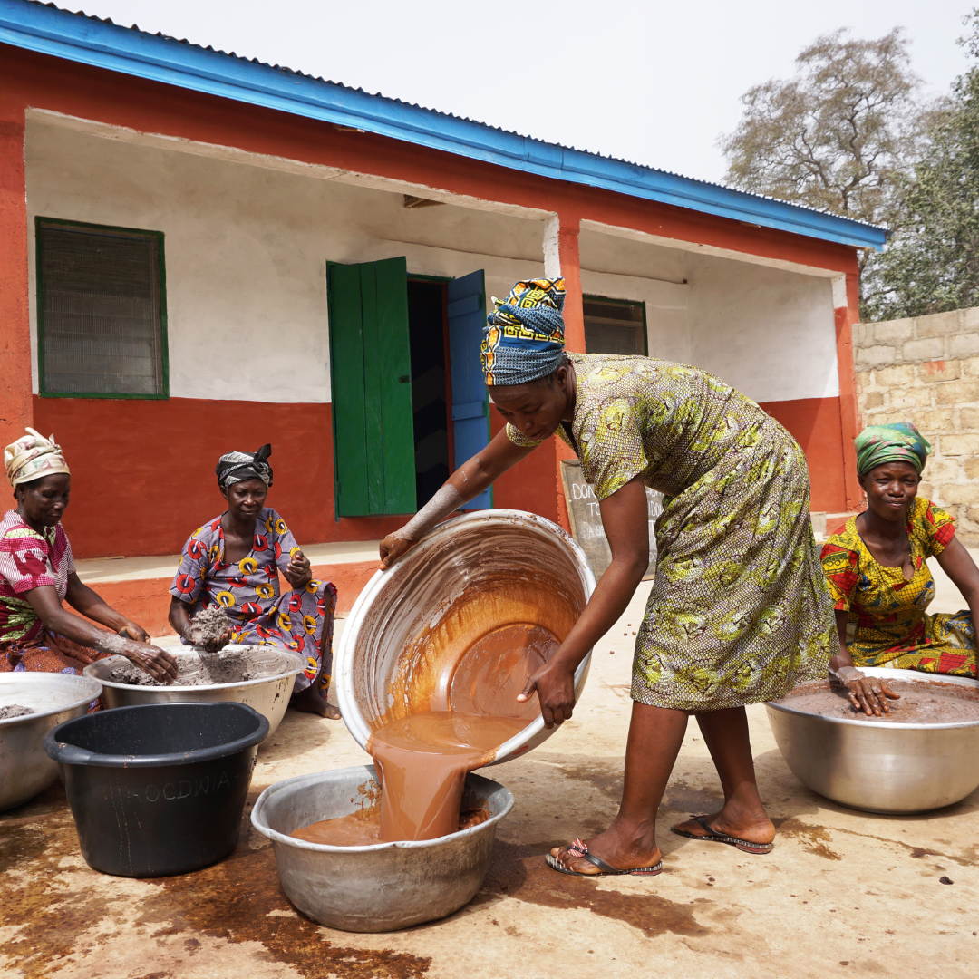 Why is our Shea butter still handcrafted? Women Own a Machine. They Do Not Use It.